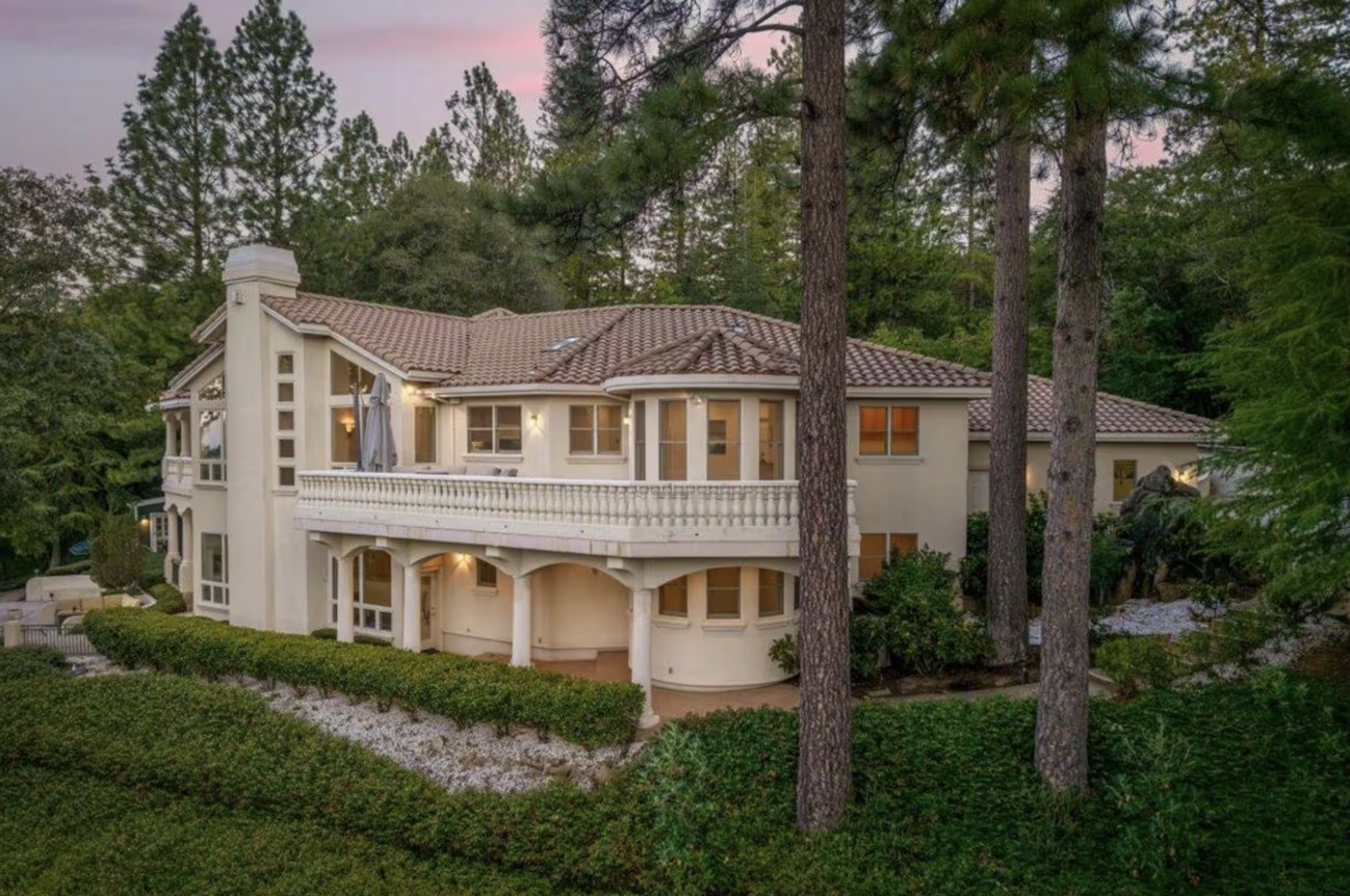 Exterior of the Nevada City retreat residence at dusk