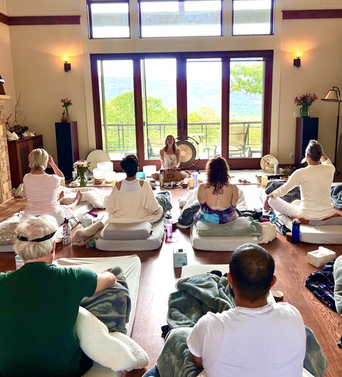 Sanctuary retreat space overlooking rolling hills with gong and instruments